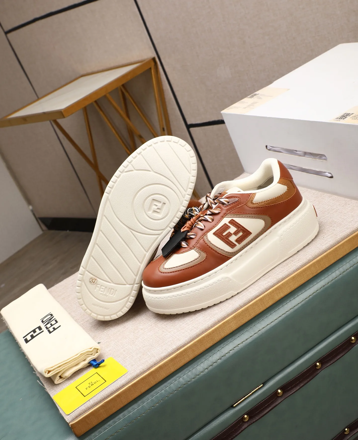 Men's shoes 💰740 Top quality Fendi Match series 25 latest colors Pendant thick sole lace casual FENDI Match lace. Made of light pink leather with white and ocher brown details. Contrast leather FF appliqué on the sides and hiking laces in white, pink and ocher brown. Thick rubber sole with oversized embossed FENDI lettering on the heel. Metal ring charm on the tongue: A small braided doll with contrasting mink fur details and gold metallic FF on the right shoe. The left shoe features a braided cord with contrasting mink double pom poms, metallic FF beads, and Pequin print pattern and logo. Upper: Original custom-made imported first-layer cowhide. Inner lining: Imported custom-made breathable mesh lining. Sole: Original open-molded ultra-light foam material. Bottom thickness: 5CM. Number of yards: women's 35-40 (custom-made 40 non-refundable).